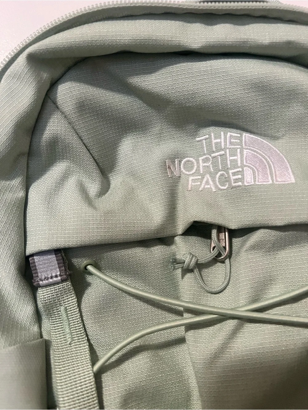 The North Face Mini Backpack in Sage Green